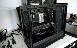 black computer tower on white table